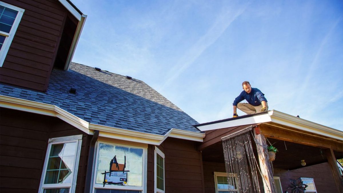 Trevor Rice on roof for SGA Inspections